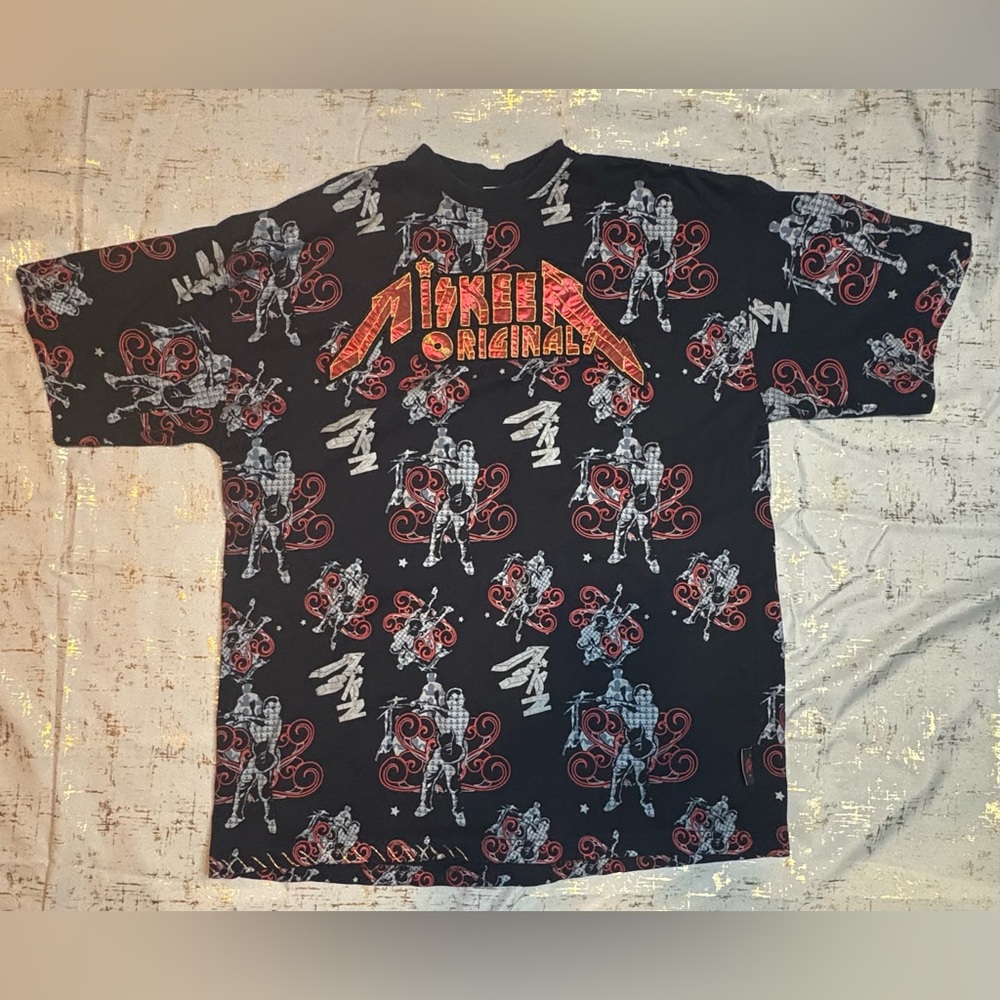 Bold black, red, gold and white shirt.